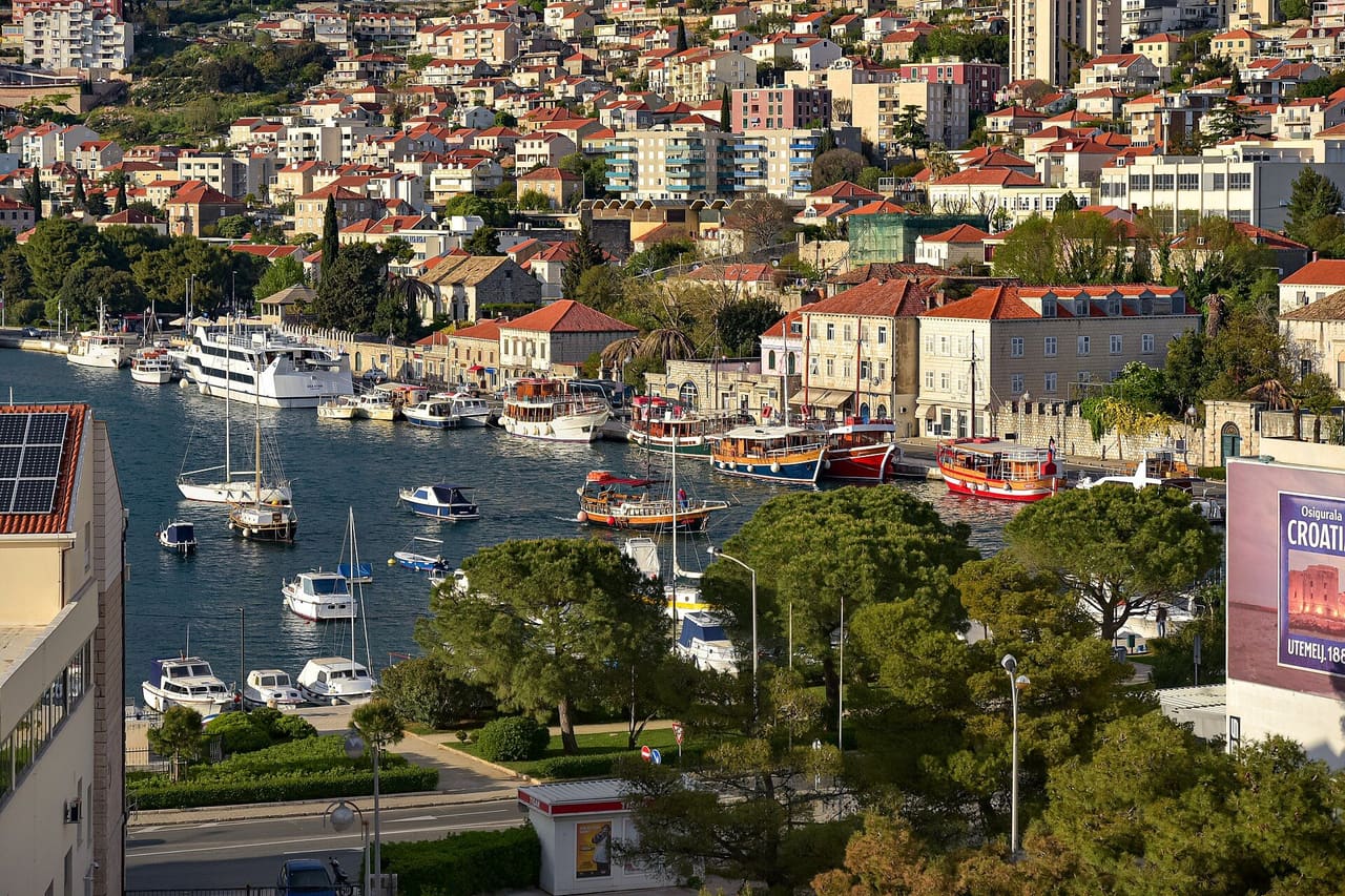 Boats and houses along the waterfront in Gruž, Dubrovnik