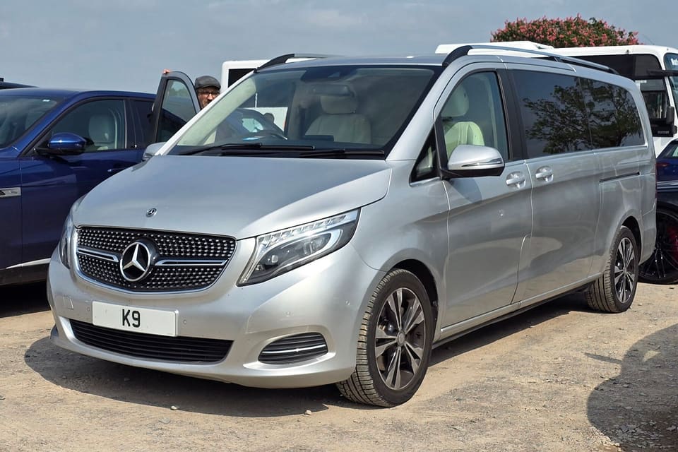 Silver Mercedes-Benz V-Class, an example of the premium minivan class